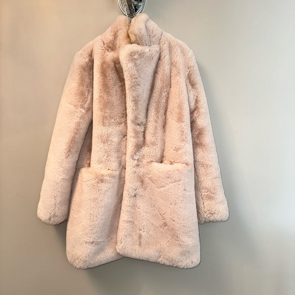 Pale pink faux-fur jacket. Lined. Has pockets. - Picture 2 of 2